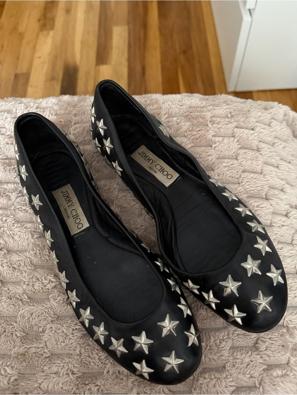 Jimmy Choo black flats with silver stars